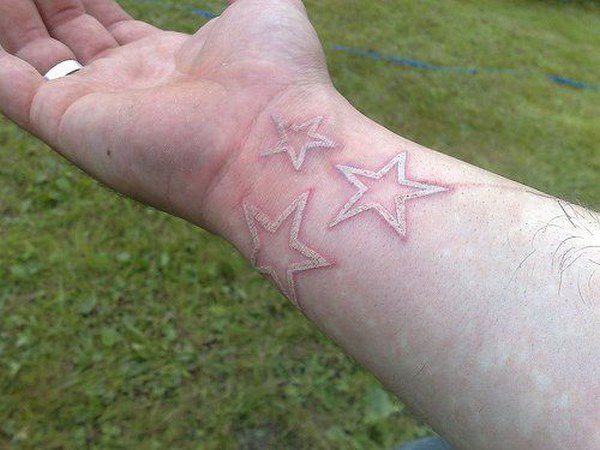 estrellas en blanco tattoo
